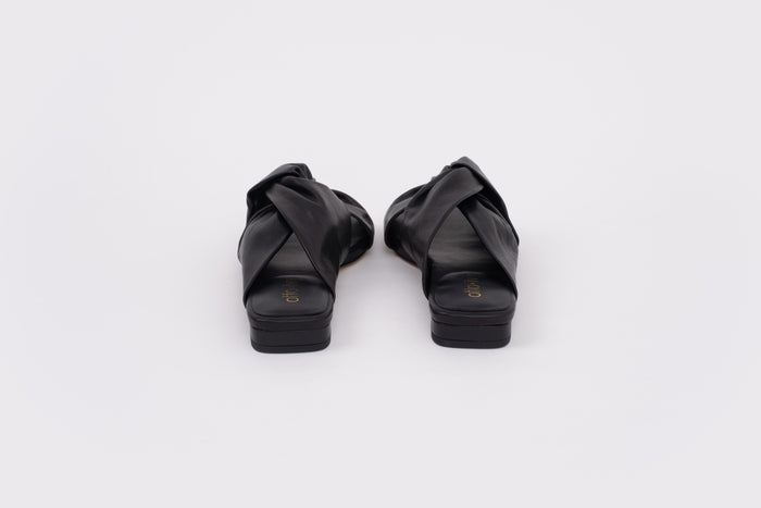 back shot of large sized black leather sandal in large womens sizes 42-46