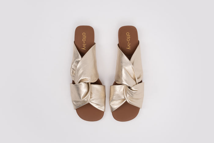 Aerial shot of gold womens sandal available in european sizes 42-46