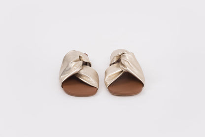 Front shot of gold lip on sandal available in larger womens sizes 42-46