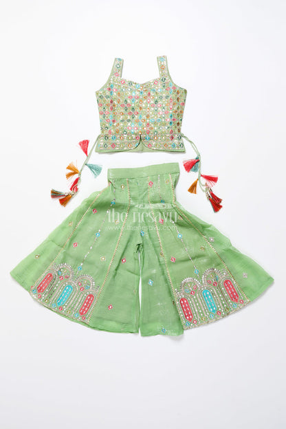 The Nesavu Girls Sharara / Plazo Set Mirror Embroidered Green Sharara Set with Colorful Tassels Nesavu Nesavu mirror embroidered georgette sharara set  girls festive ethnic wear
