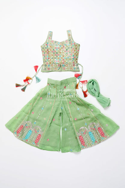 The Nesavu Girls Sharara / Plazo Set Mirror Embroidered Green Sharara Set with Colorful Tassels Nesavu Nesavu mirror embroidered georgette sharara set  girls festive ethnic wear