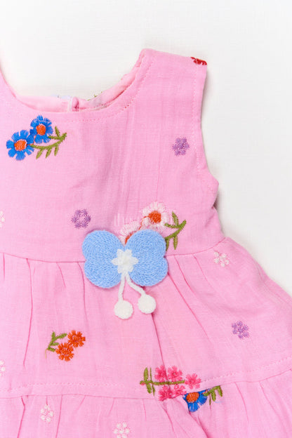 The Nesavu Baby Cotton Frocks Muslin Cotton Frock for Baby Girl’s Playdates and Summer Wear Nesavu Nesavu muslin cotton frock with embroidery and butterfly patch for baby girl’s casual summer days