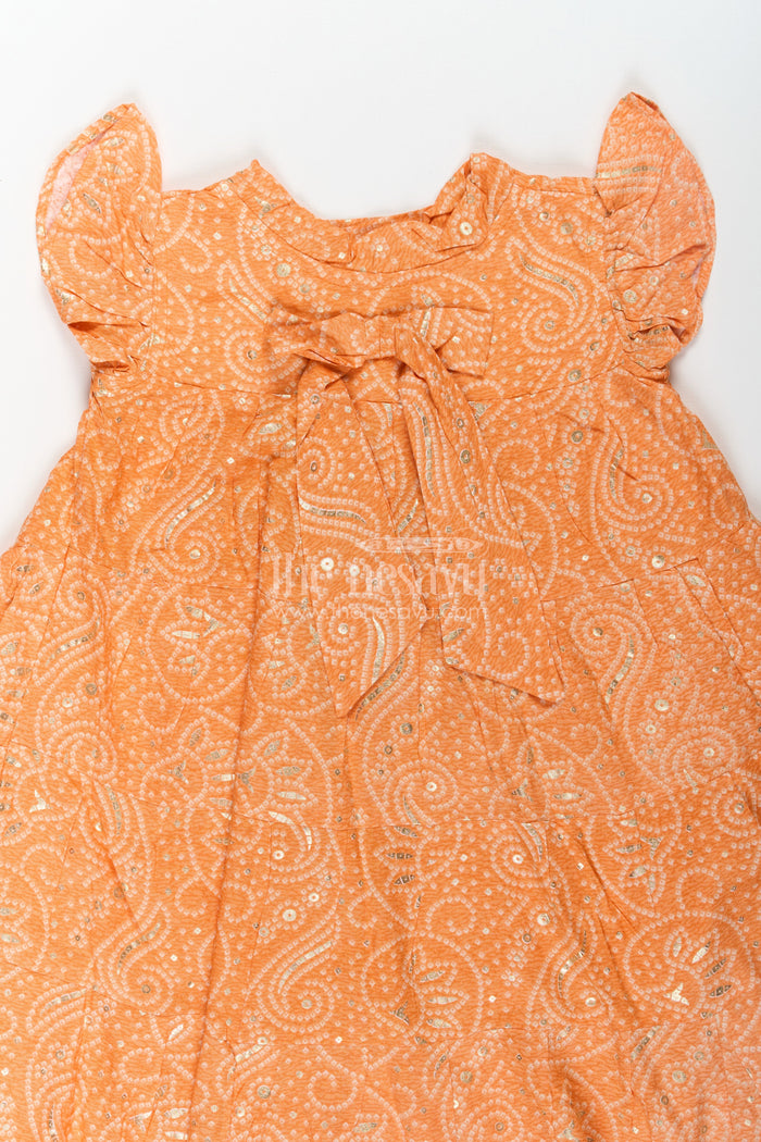 The Nesavu Girls Cotton Frock Nesavu Casual Cotton Frocks for Girls in Rayon with Orange Bandhani Print and Gold Foil Details Nesavu Nesavu Casual Cotton Frocks Girls Rayon Orange Bandhani Print Gold Foil Details