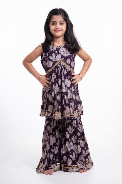 The Nesavu Girls Sharara / Plazo Set Nesavu Modal Silk Printed Sleeveless Sharara Set for Girls Navratri Festive Wear Nesavu Modal Silk Sleeveless Sharara Set for Girls Navratri Festive Wear | The Nesavu