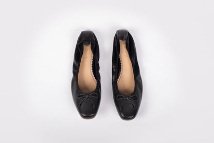 Aerial shot of Olivia Flats in black. A womens large sizes elasticated pump in Uk sizes 8-12