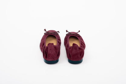 Back shot of large sized womens burgundy red purple suede ballet flats in large sizes 8 9 10 11 12