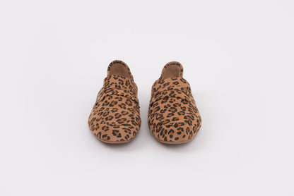 Size 9 womens Pair of leopard print slippers on a white background