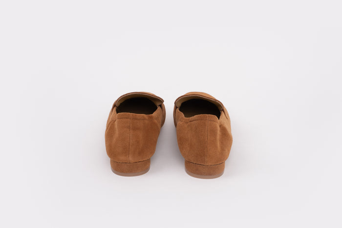 Size 9 pair of womens Pair of brown suede shoes on a white background