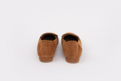 Size 9 pair of womens Pair of brown suede shoes on a white background