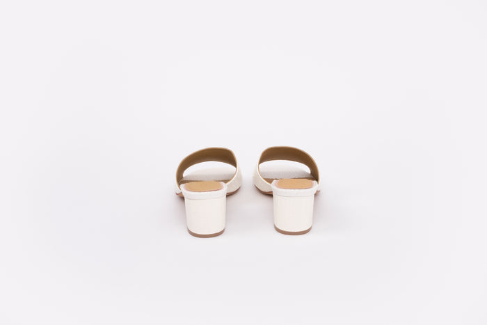 Back shot of cream leather heeled sandals available in larger womens sizes 42-46