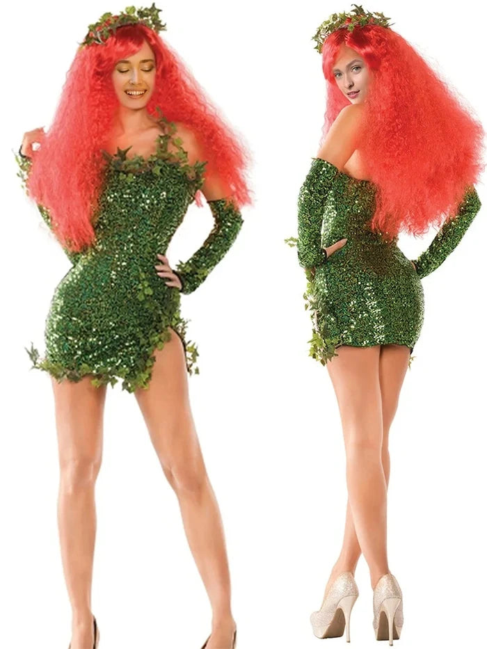Person wearing a green sequin dress with ivy leaves and red wig on a white background