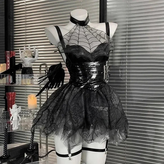 Black lace costume on a mannequin against a window with blinds