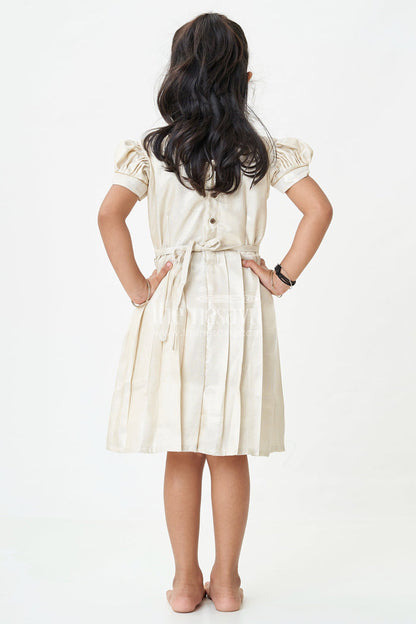 The Nesavu Silk Frock Silk Frock for Baby Girl in Ivory Tissue Silk with Emerald Embellished Yoke and Puff Sleeves Nesavu Nesavu Silk Frock Baby Girl Ivory Tissue Silk Emerald Embellished Yoke Puff Sleeves