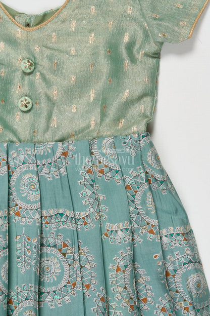 The Nesavu Girls Silk Gown Silk Gown for Girls for Temple Visits and Traditional Gatherings Nesavu Nesavu girls silk gown with tissue silk yoke and mandala prints for poojas and temple visits