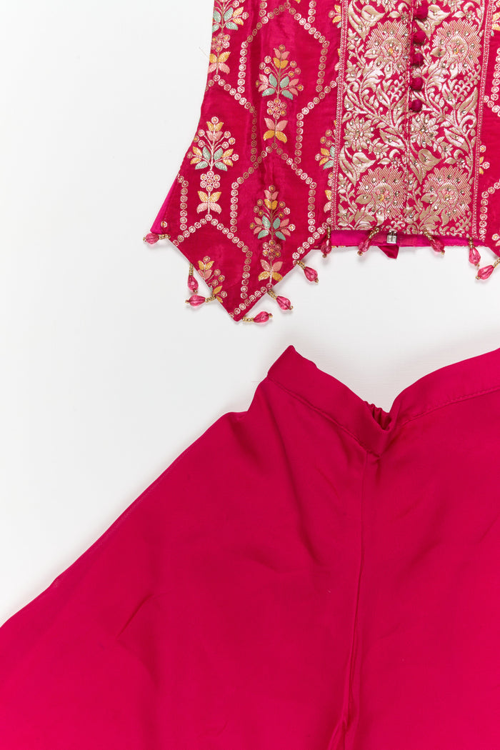 The Nesavu Girls Sharara / Plazo Set Sleeveless Plazo Set for Girls with Festive Embroidery and Tassel Detailing Nesavu Nesavu sleeveless plazo set for girls with embroidered yoke and festive tassel trims – perfect for birthday and temple events
