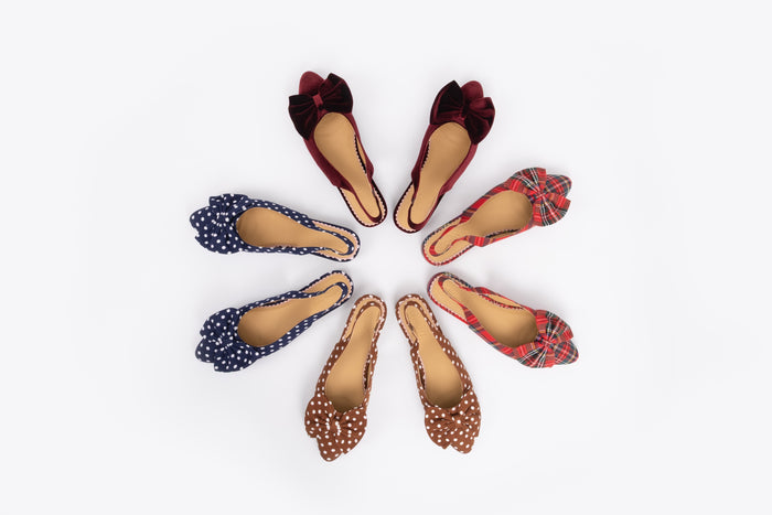 Aerial shot of womens bow slingback collection in larger womens sizes 8-12