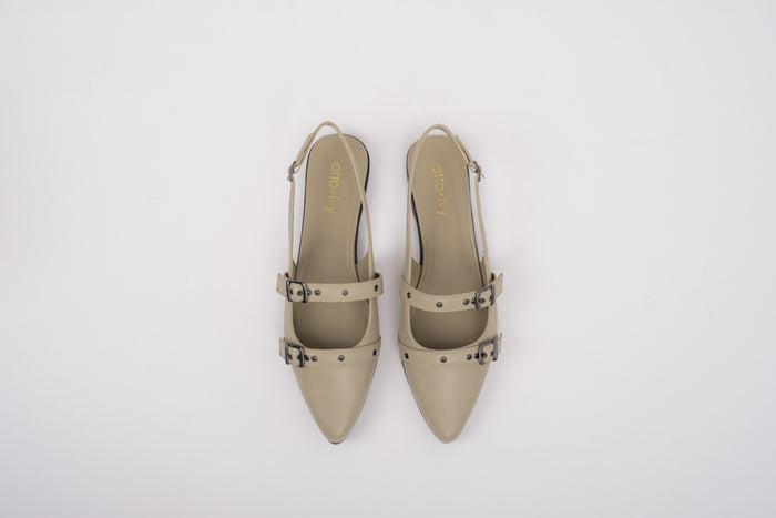 Aerial shot of womens large size beige leather flat slingback shoes in sizes 8 9 10 11 12