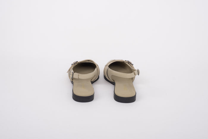 Back shot of womens beige leather slingback flat shoe in large sizes 8-12