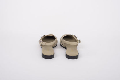 Back shot of womens beige leather slingback flat shoe in large sizes 8-12