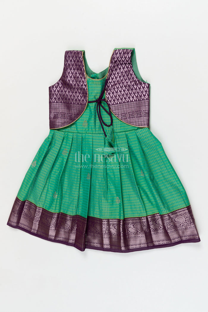 The Nesavu Girls Kanchi Silk Frock Temple Wear Silk Frock for Toddler Girls with Kanchivaram Saree Inspired Zari Border Nesavu Nesavu toddler girl temple wear silk frock with Kanchivaram style zari borders and contrast jacquard yoke