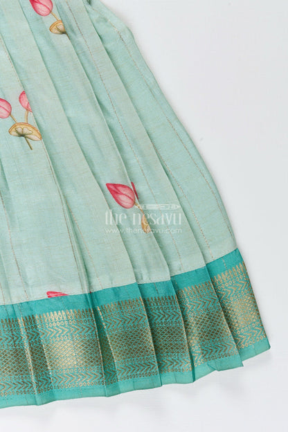 The Nesavu Silk Frock Toddler girl semi silk frock for weddings and cultural events Nesavu Nesavu pastel green semi silk frock toddler girls zari border floral accents
