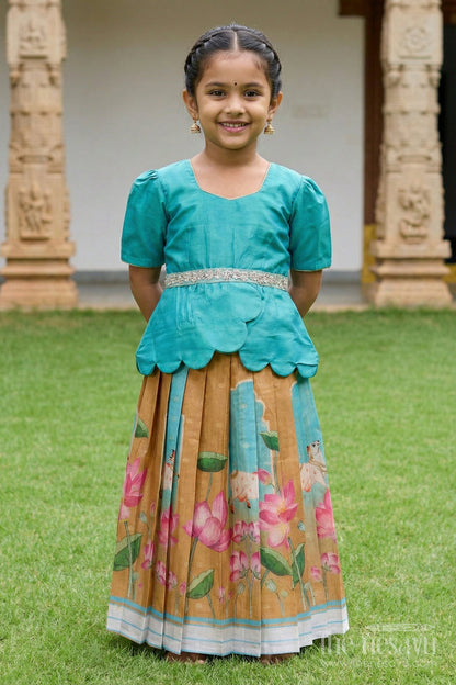 The Nesavu Pattu Pavadai Traditional Baby Pattu Pavadai with Lotus Print Skirt for Festive Photoshoots Nesavu Nesavu baby pattu pavadai with lotus print skirt and scallop blouse for festive occasions