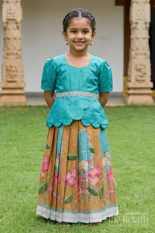 The Nesavu Pattu Pavadai Traditional Baby Pattu Pavadai with Lotus Print Skirt for Festive Photoshoots Nesavu Nesavu baby pattu pavadai with lotus print skirt and scallop blouse for festive occasions