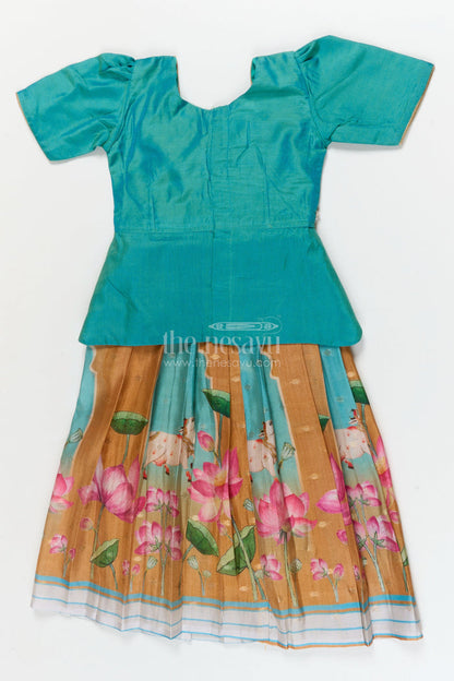 The Nesavu Pattu Pavadai Traditional Baby Pattu Pavadai with Lotus Print Skirt for Festive Photoshoots Nesavu Nesavu baby pattu pavadai with lotus print skirt and scallop blouse for festive occasions