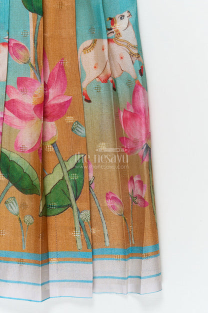 The Nesavu Pattu Pavadai Traditional Baby Pattu Pavadai with Lotus Print Skirt for Festive Photoshoots Nesavu Nesavu baby pattu pavadai with lotus print skirt and scallop blouse for festive occasions