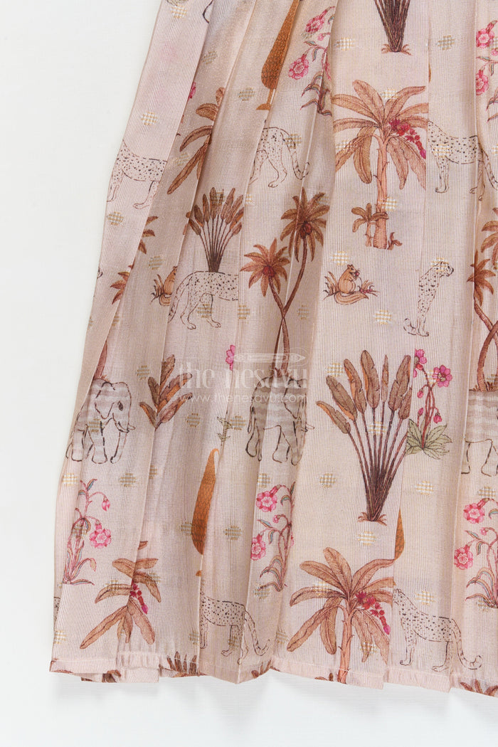The Nesavu Pattu Pavadai Traditional Wrap-style Baby Pattu Pavadai for Festive Milestones Nesavu Nesavu wrap-style baby pattu pavadai with jungle print skirt for traditional festivities