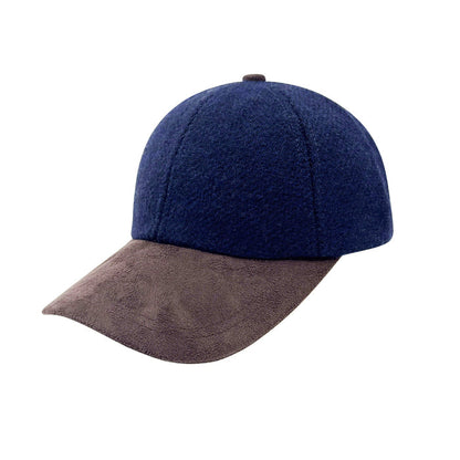 Navy blue and brown suede baseball cap on a white background